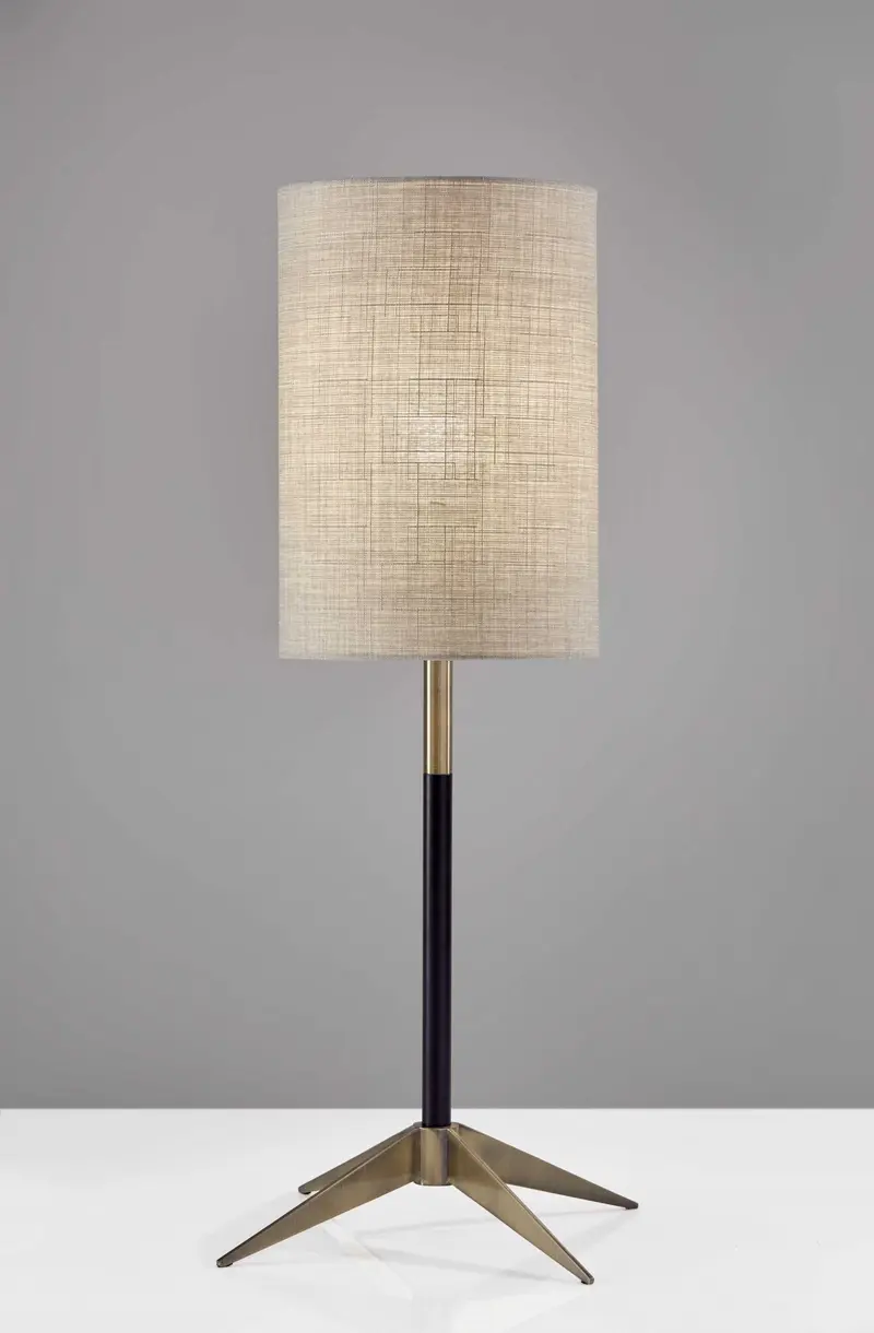 Antique Brass Metal Tripod Base with Matte Black Accent and Tall Natural Fabric Shade Table Lamp By Homeroots