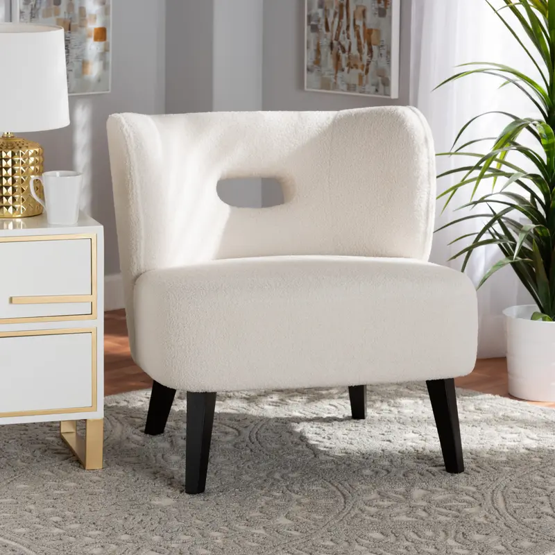 Baxton Studio Naara Modern and Contemporary Ivory Boucle Upholstered and Black Finished Wood Accent Chair