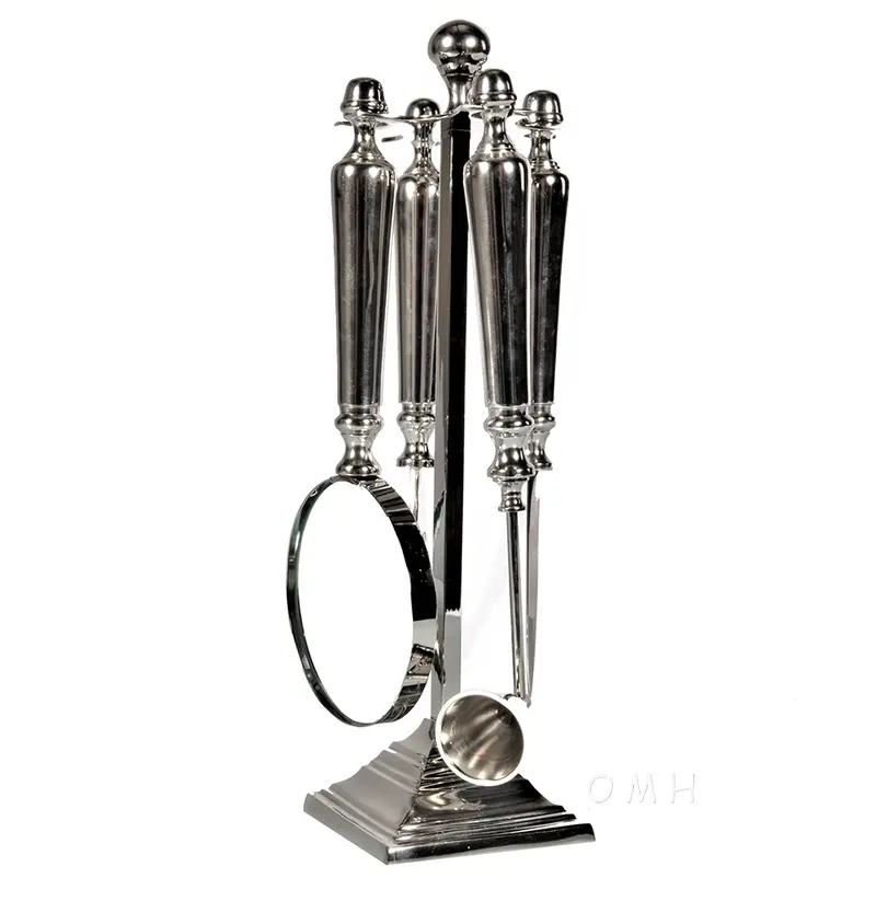 Magnifying glassLetter openerBottle openerand a Candle snuffer Functional Decor By Homeroots