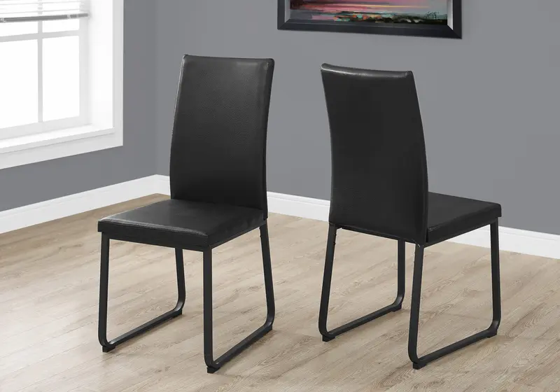 Two 38" Black Faux Leather And Metal Dining Chairs By Homeroots