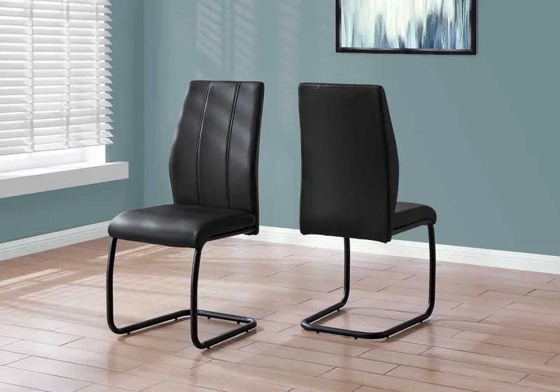 Two 77.5" Black Leather Look Chrome Metal And Foam Dining Chairs By Homeroots